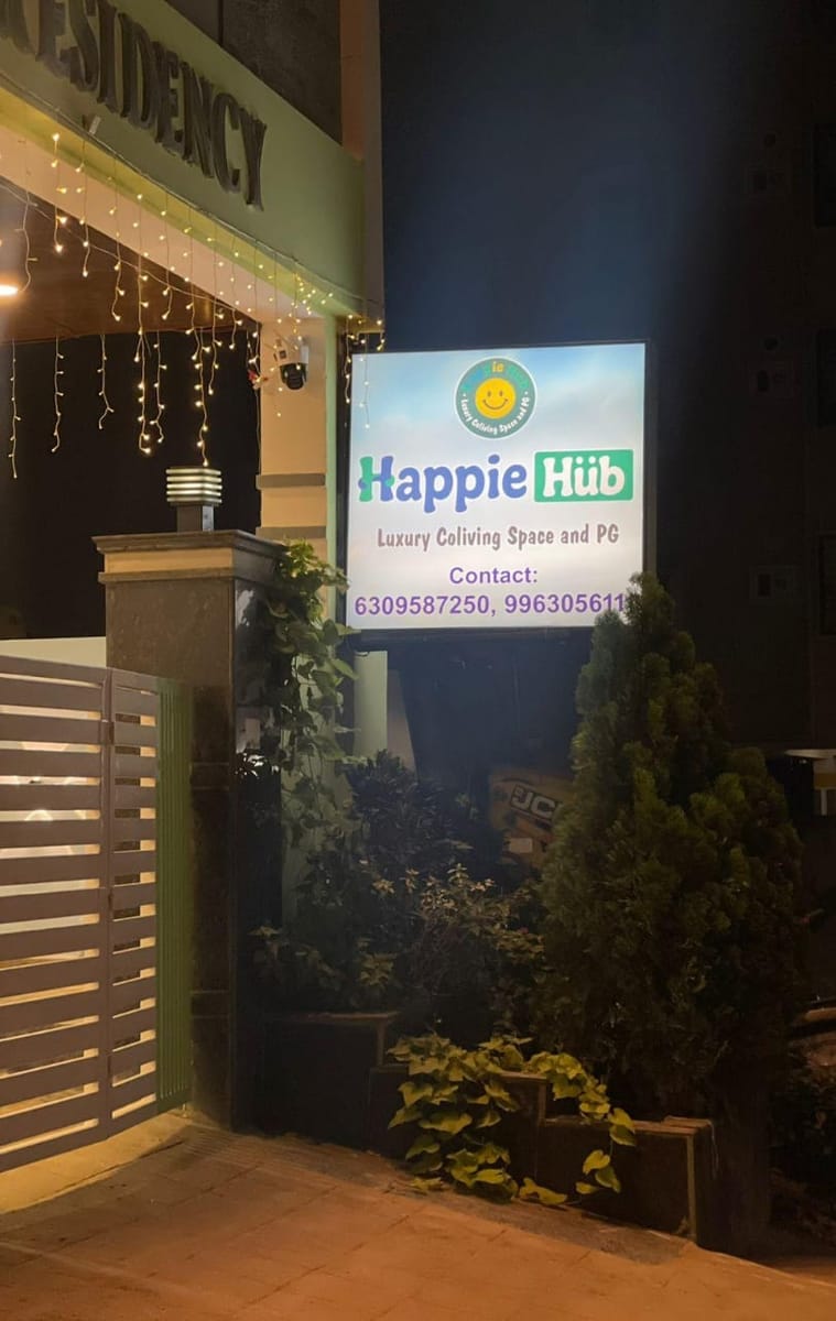 Happie Hub PG entrance signboard